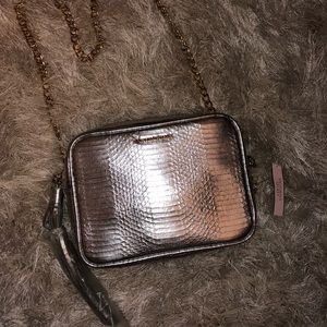 Victoria’s Secret Silver foiled sling purse